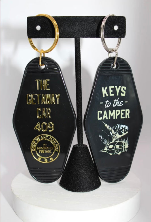 Getaway car and Camper hotel keychains